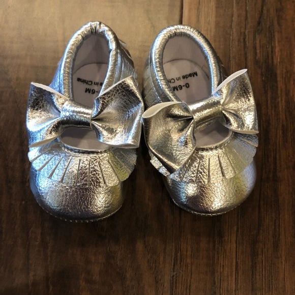 silver moccasin shoes